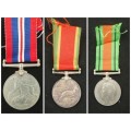 African Service Medal , The Defense Medal and The War Medal JL Wright 27612
