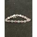 A Dainty Silver , Marcasite and Garent Bracelet