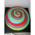 A SOUTH AFRICAN ARTS AND CRAFTS HANDMADE COLOURFUL  TELEPHONE WIRE FRUIT BASKET