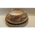 An early 19th Century  Derby Cabinet cup saucer and side plate