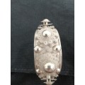 A BEAUTIFUL VINTAGE SIAM SILVER BRACELET WITH RAISED BOSSES. CIRCA 1940