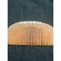 A PRETTY ANTIQUE HAIR PIN/COMB POSSIBLY BAKELITE WITH SEED PEARLS