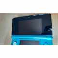 Nintendo 3ds console with charger