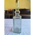 Beautiful light green vintage style square shaped bottle with cork