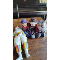 Four collectable porcelain / ceramic clown (jester) dolls - all for one price!