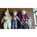 Marked down! Four collectable porcelain / ceramic clown (jester) dolls - all for one price!