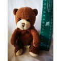 Adorable little Prima Toys brown bear on offer