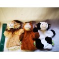 Three "animal planet" hand puppets on auction