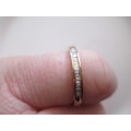 LOVELY GOLD LADIES WEDDING BAND 9 CT RING WITH SMALL SQUARE DIAMONDS?