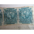 SOUTH AFRICA USED 4 MOUNTED STAMPS