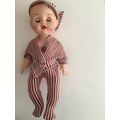 VINTAGE BABY RUBBER TYPE DOLL WITH ORIGINAL CLOTHES MOVING EYES AND LETTER  J ON NECK