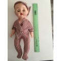 VINTAGE BABY RUBBER TYPE DOLL WITH ORIGINAL CLOTHES MOVING EYES AND LETTER  J ON NECK