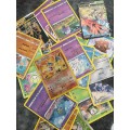 DECK VAULT METAL BOX FULL OF ``REPLICA`` POKEMON CARDS NICE FOR KIDDIES TO PLAY WITH!!! OVER 100