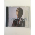 2 LOVELY MUSIC CD`S WOMAN II  AND DUA LIPA