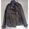 Truworths Man rain jacket in size XL. Double breasted, removeable hood