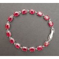 ** STUNNING:  22.8 ct Pigeon Blood Ruby and .925 Sterling Silver Bracelet 15 x Stones (Certified).**