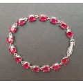 ** STUNNING:  22.8 ct Pigeon Blood Ruby and .925 Sterling Silver Bracelet 15 x Stones (Certified).**