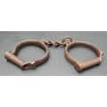 ** 1920s South African Police (S.A.P) Marked Iron Handcuffs (S.M. Co.).**