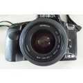Minolta Dynax 300 si. FILM camera with 35 to 70 Zoom and auto focus and advance.
