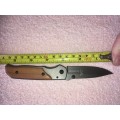 Browning pocket knife with wooden handle