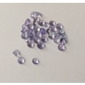 1.105cts TANZANITE - ROUND CUT - EXCELLENT TOP COLOR - 36 STONES 0.035 POINTERS