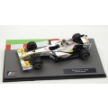 Brawn GP 01 as driven by Jenson Button in 2009 with magazine