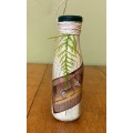DECORATED BOTTLE with LEOPARD & PORCUPINE WALL HANGING ORNAMENT.