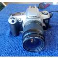 Canon EOS 500N 35mm film camera with 28 to 80mm zoom lens.