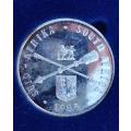1985 SILVER PARLIAMENTARY ONE RAND - LOW MINTAGE - 15,839 - THIS COIN IS A FIRST TYPE.