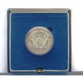 1991 Silver Protea One Rand. Nursing - Low Mintage 8 675 - Issued in Blue SAM Case.