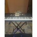 YAMAHA PSR E223 PIANO (ITEM IN WORKING CONDITION) (COMES WITH CARRIER CASE AND CABLES)