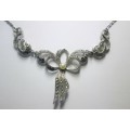 1950 Marcasite and Faux Pearl Abstract Bow Panel Design