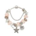 Charming Light Pink and Silver colour bracelet with Ocean Life themed charms