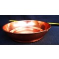 vintage red copper dish with rolled edge