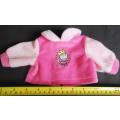 bright fluffy long sleeved top for a princess of a baby doll