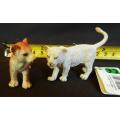 collectable Baby Puma and Schleich white lion cub walking.