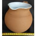 Beautiful classic shape terracotta jug with white glaze inside from Italy