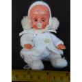 Collectable Vintage hard plastic baby doll with dummy made in Hong Kong and very well dressed