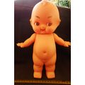 Vintage Kewpie Doll with brown eyes. 31 cm high