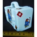 Collectable Porcelain Paddington TeddyBear Money box in the shape of a suitcase