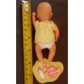 collectable mini baby doll by Simba with Zapf mini Baby Born accessories