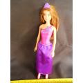 Barbie Princess Doll with brown hair and dress in fuchsia