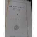 The holy qur-an tex,translation and commentary