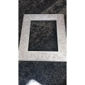 Silver coverd wooden frame