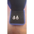Sterling silver earrings with purple stone