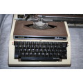 A VINTAGE TYPE WRITER - BROTHER - ELECTRIC 3112 - MODEL NO. 3112 - 220V - 50Hz - BROTHER INDUSTRIES.
