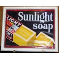 A MARVELOUS VINTAGE STYLE PRINT SUNLIGHT SOAP BEHIND GLASS IN A STUNNING WOODEN SHABBY CHIC FRAME
