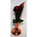This is a gorgeous, Tulip shaped hand crafted orange copper vase. It can give a beautiful rustic fee