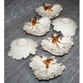 SIX STYLISH PORCELAIN BONE DISHES BEAUTIFULLY DECORATED WITH A GOLD TRIM!!