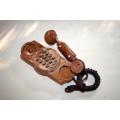 A GORGEOUS ANTIQUE LOOKING SYNTHETIC TELEPHONE IN WORKING CONDITION